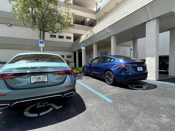 Back parking lot entrance with handicap accessible parking